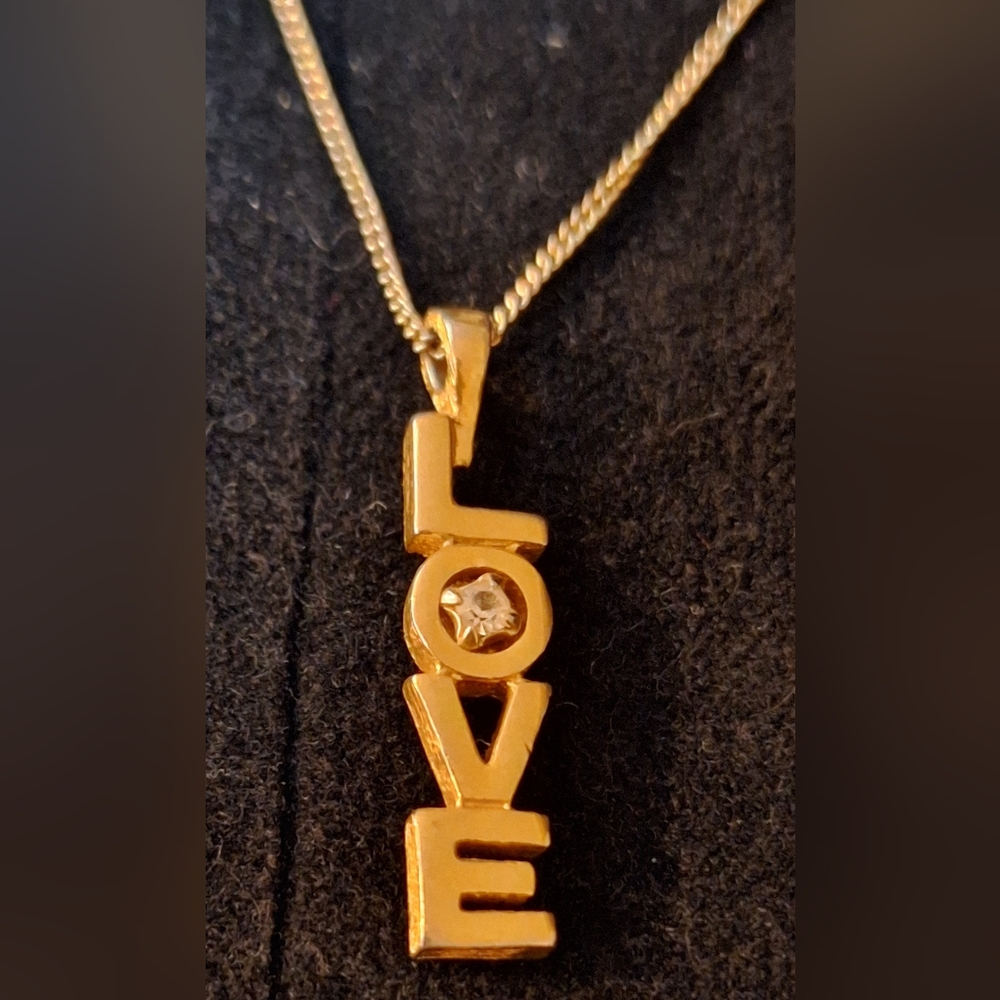 AVON Gold Tone 'LOVE' Pendant Necklace with Cubic Zirconia